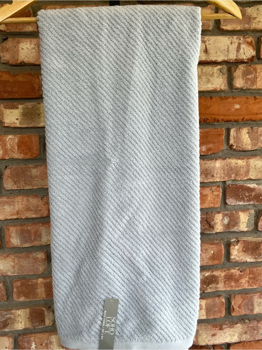 Soho Light Blue Textured Bath Towel New with tags. 30x52